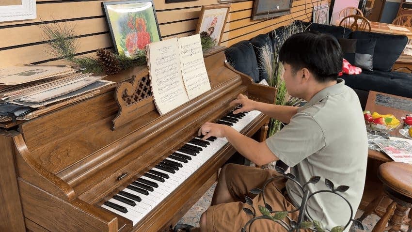Photo of Pacific Antiques Mall lunchroom piano at 10228 Pacific Ave S, Tacoma, WA 98444. The mall identifies this as a public piano in its lunchroom and says it is in…