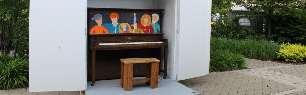 Photo of Halte du Village public piano at Montée Robert at rue Savaria, Saint-Basile-le-Grand QC. Everyone may play daily 09:00–20:00 through September 2026, weather permitting.