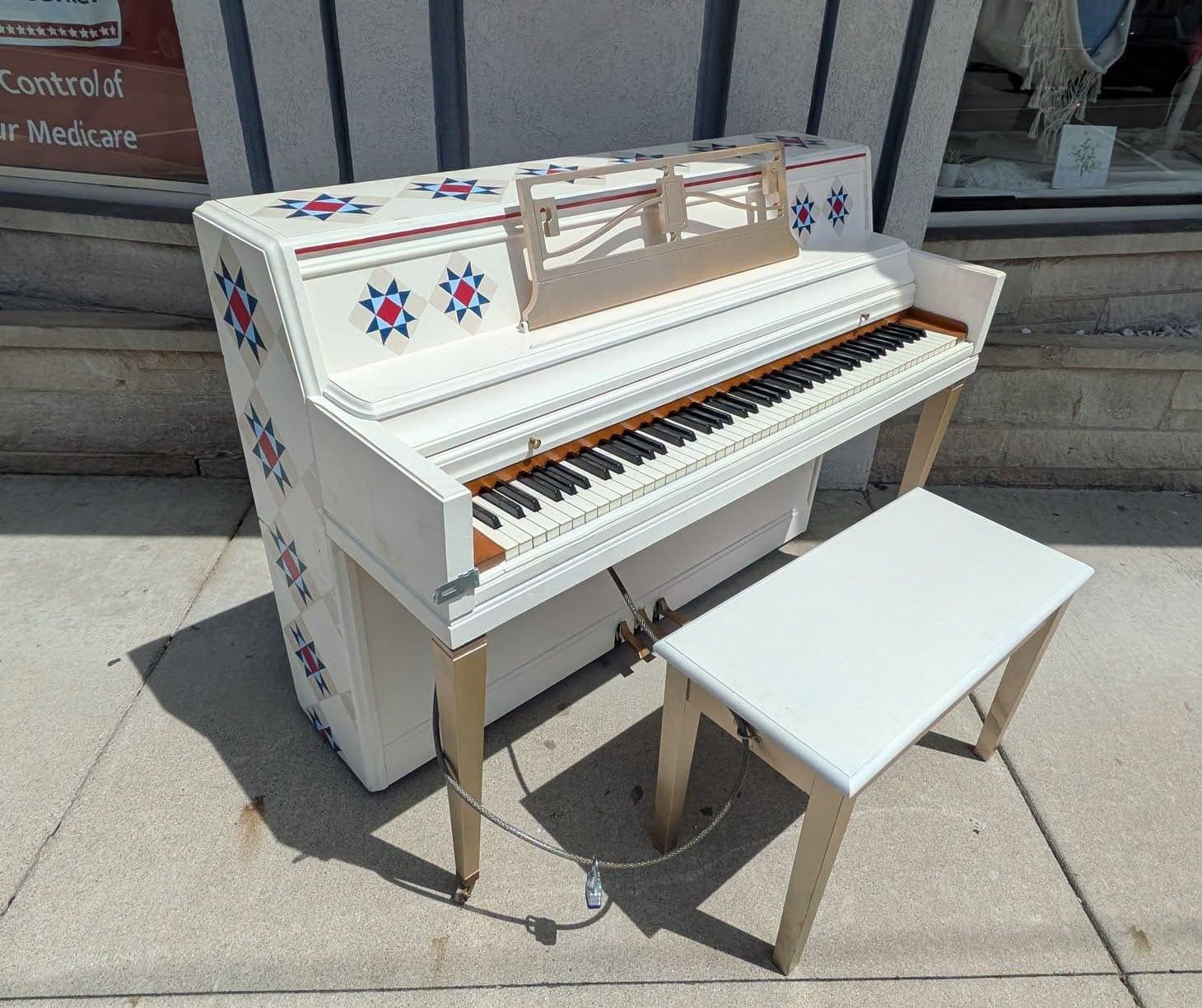 Photo of Ohio’s First and Originals at 217 SE Public Square, Troy OH 45373. Painted Piano Project unit near Oh! Boba; publicly playable through August 2026.