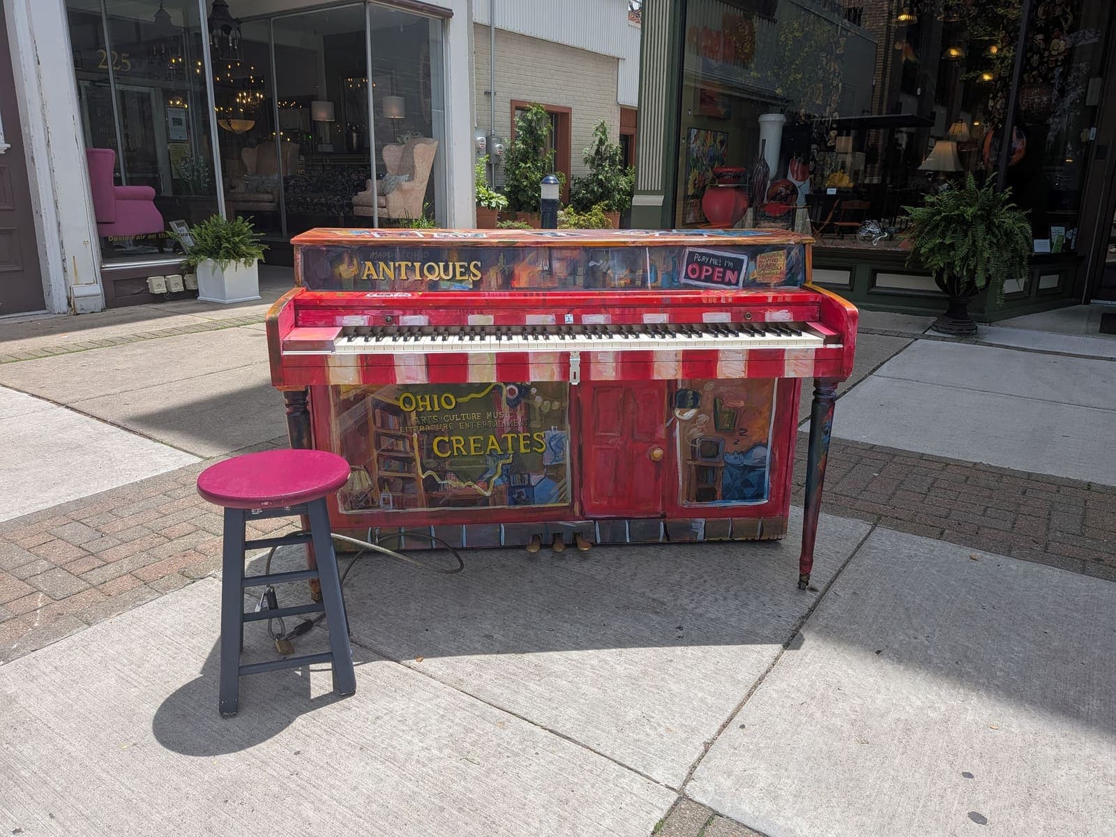 Photo of Ohio Entertains and Creates at 117 S Market Street, Troy OH 45373. Painted Piano Project unit near Rest & Renewal; publicly playable through…
