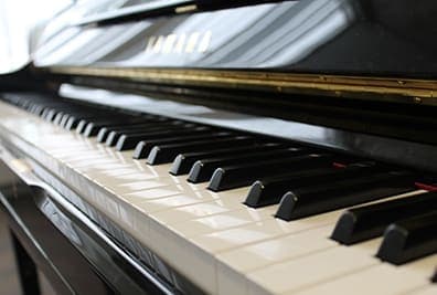 Photo of Hamilton Central Library Piano Practice Room at 55 York Boulevard, Hamilton ON L8N 4E4. Cardholders may reserve one-hour sessions.
