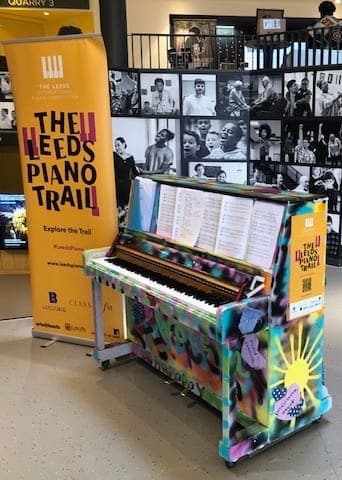 Photo of Leeds Playhouse Piano at Playhouse Square, Quarry Hill, Arena Quarter, Lovell Park, Leeds, West Yorkshire, England, LS2 7BT, United Kingdom. A brightly decorated Heydays…