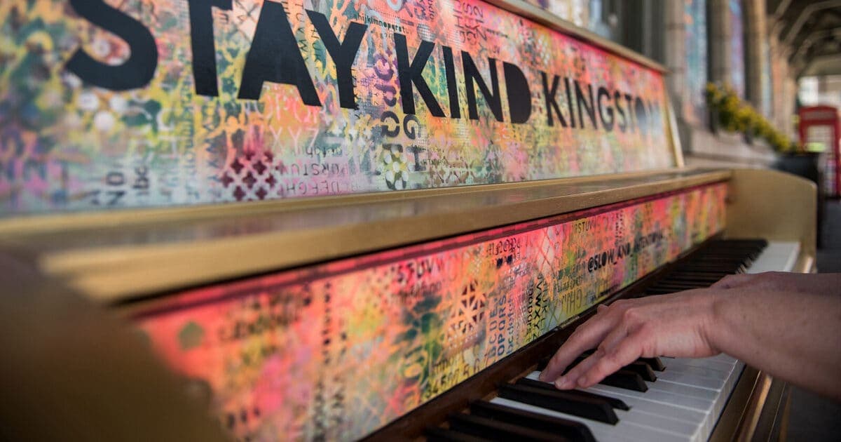 Photo of Visitor Information Centre public-art piano at 209 Ontario Street, Kingston ON K7L 2Z1. Anyone may play during visitor-centre hours.