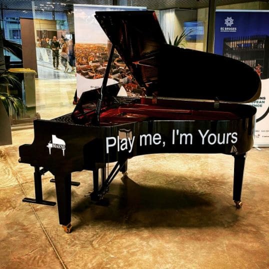 Public piano in Bruges, West Flanders, Belgium