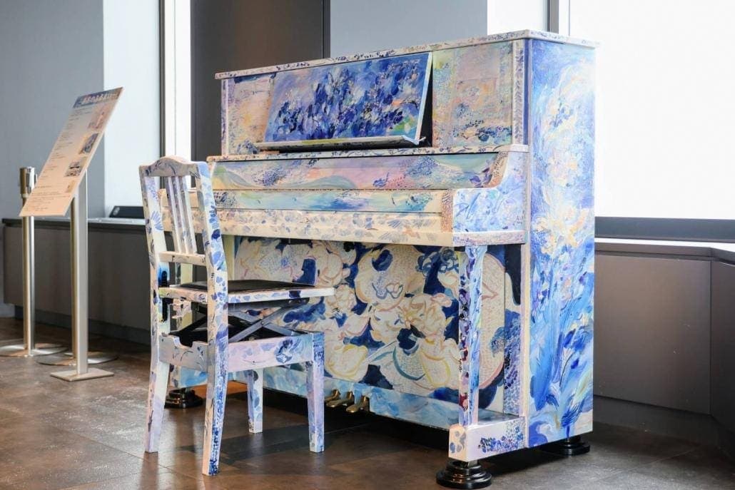 Photo of Aono Furumai street piano at 〒170-8630 東京都豊島区東池袋三丁目1番 サンシャインシティ サンシャイン60ビル60階. Toshima Ward's blue art piano in the event space on the 60th-floor…