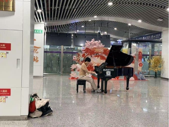 Photo of Chongqing North Railway Station South Square Public Piano at Chongqing North Railway Station, 51 Kunlun Avenue, Yubei District, Chongqing 401122, China. A public-benefit…